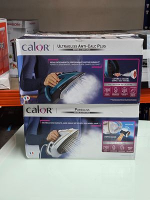 two boxes of gator products on display in a store