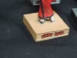 toy figurines of a woman in a red kimono outfit and a man in a red kimono outfit