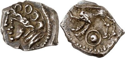 a silver coin with an image of a man on it