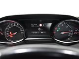 a close up of a car dashboard with a speedometer and gauges