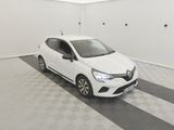 the white car is parked in the garage on the checkered floor