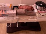 a table with many items on it and a crock pot on top