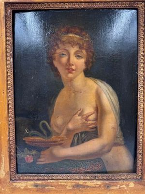 tableau représentant une femme tenant un bol de fruits, dans un cadre en bois