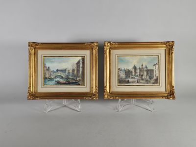 deux tableaux encadrés représentant un paysage urbain et un pont