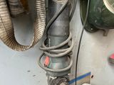 an image of a machine that is in a garage