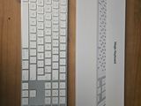 a box with a keyboard and a mouse on a table