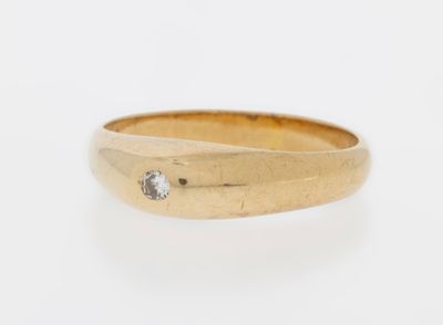 an image of a gold ring with a diamond on it