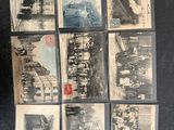 a lot of old postcards that are on the table