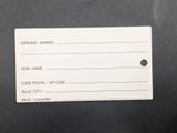 a picture of a name tag on a black surface