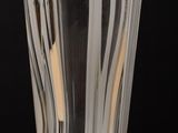 a glass that is sitting on a table