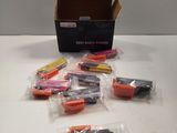 a box full of pens and pencils sitting on a table
