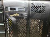 an image of a machine that has a lot of dirt on it