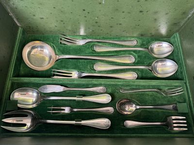 a green box with a set of silverware in it