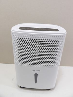 un purificateur d'air blanc posé sur une table