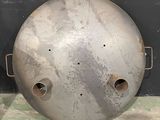 a large metal object with holes in the middle of it