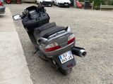 a motorcycle that is parked on the side of the road