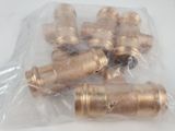 six brass pipes in a plastic bag on a white surface