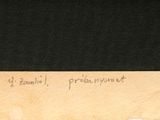 an old piece of paper with writing on it sitting on top of a table