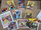 a lot of comic books on the table