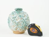 a picture of a measuring tape next to a vase