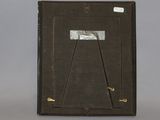 a black book with a picture of a cat on it