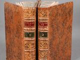 an old book with two pages that have been opened to reveal a picture