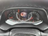 a close up of a dashboard with a speedometer and gauges