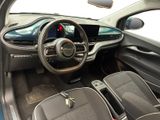 the interior of a car with a steering wheel and a dashboard