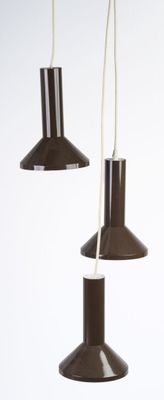 three brown lamps hanging from a white ceiling in a room