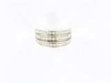 a close up of a stack of three rings on a white surface