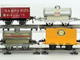 two train cars that are sitting on a train track