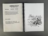 an open book on a table with a drawing of a man on a horse