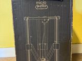 a box with a picture of a machine inside of it