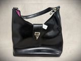 black leather handbag with pink lining and silver hardware