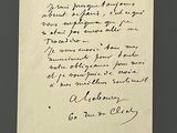 an old handwritten letter is on a piece of paper