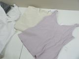 three shirts on the floor next to each other