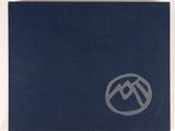 a blue book with a mountain logo on it