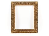 an old gold frame with a decorative pattern on it