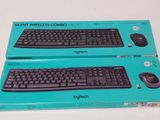 two boxes with a keyboard and a mouse in them