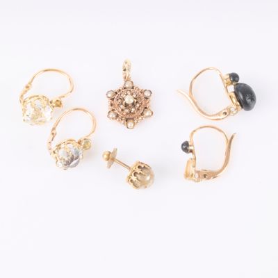 a set of five pairs of earrings and rings
