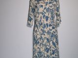 an image of a dress on a mannequin stand