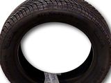 a close up of a tire on a white background