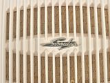 a close up view of a bathroom exhaust fan with the word smoker on it