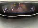 the dashboard of a car with a digital display on it