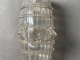 a glass object that is sitting on a table