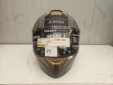 a close up of a helmet on a table with a price tag