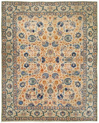an antique persian rug with blue and orange colors