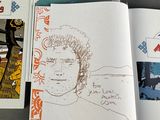a book with a drawing of a man on it