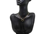 a close up of a mannequin head with a necklace on it