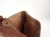 a brown leather wallet with a coin inside of it